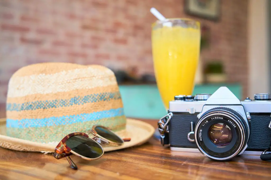 sunglasses and camera