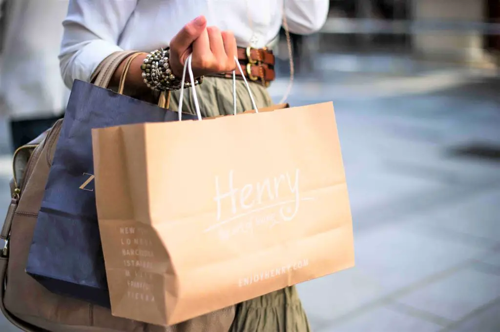 woman carrying shopping bags