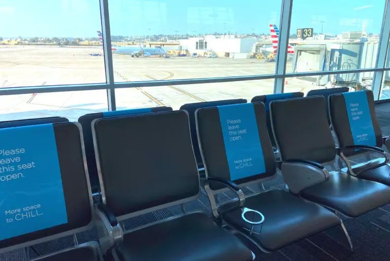 Many seats and tables were marked off to ensure social distancing in the airport