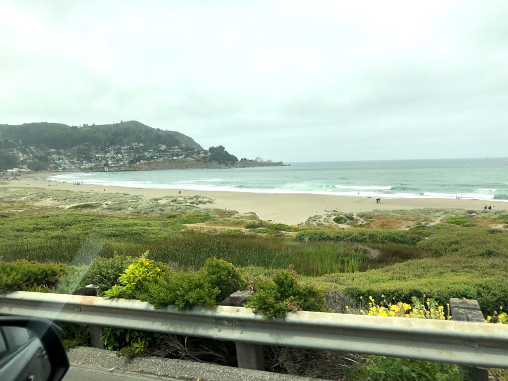 image of pch coastline from car window