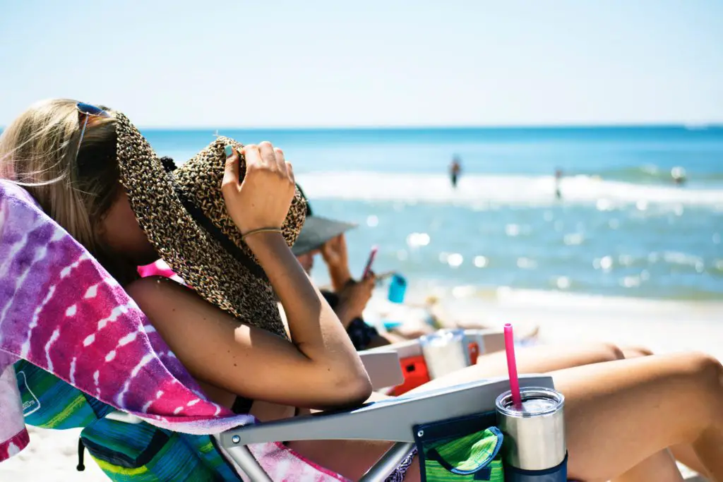 woman tanning at the beach