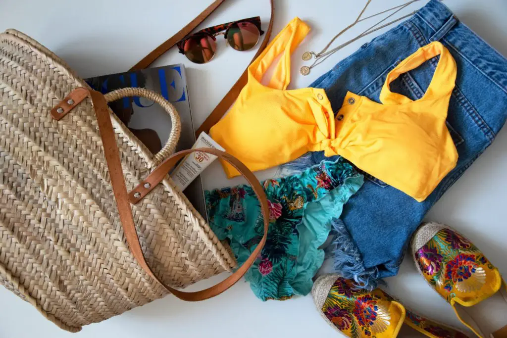 beach bag showing must-haves for the beach