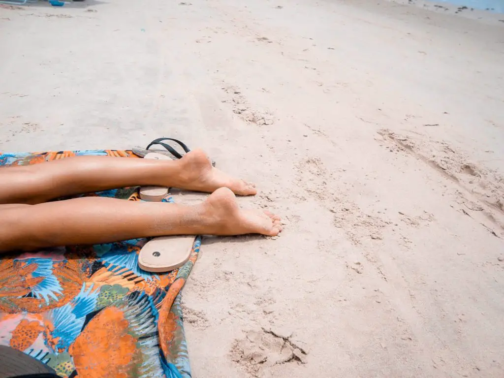 a beach towel is a beach day essential