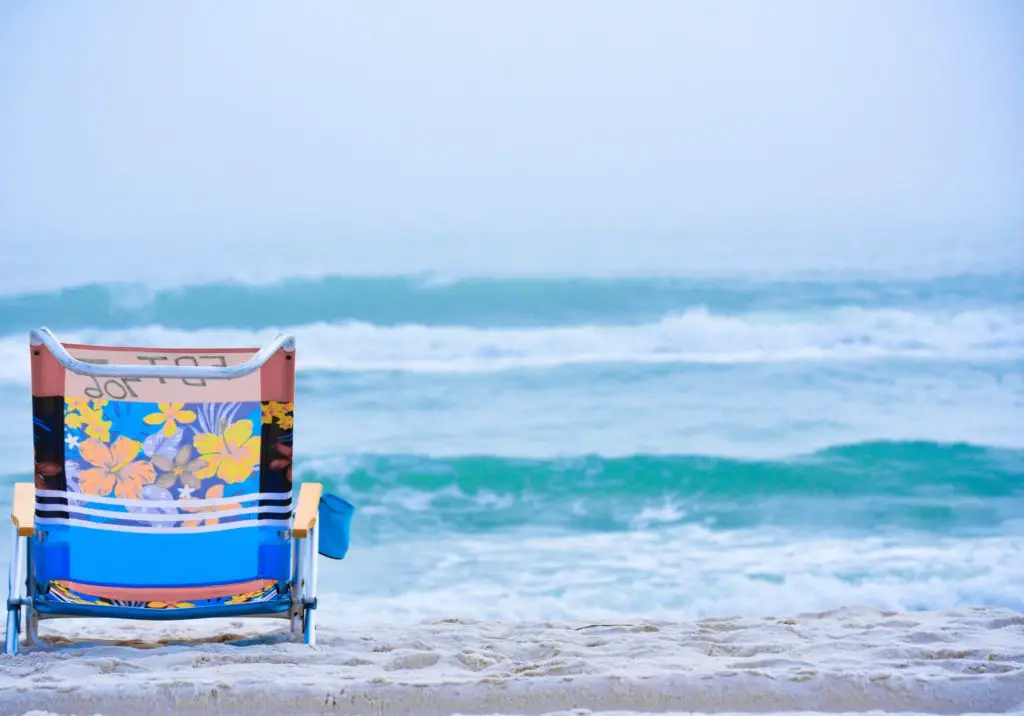 a beach chair is a beach day essential
