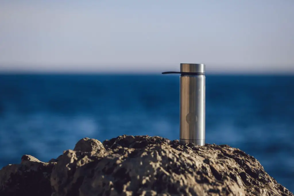 a reusable water bottle is a beach day essential